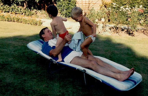 Dad O and J on the sunbed.jpg